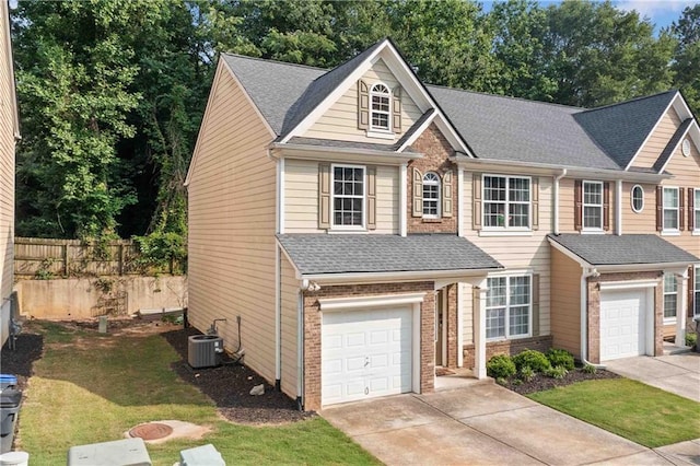 4161 Magnolia Glen Walk, Norcross, GA 30093 - view of front of house featuring concrete driveway, an attached garage, brick siding, and roof with shingles