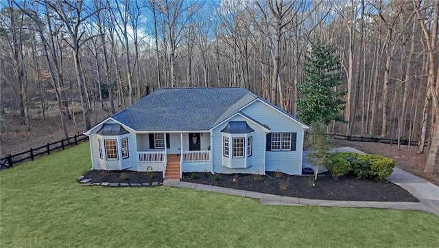 view of front facade with a porch and a front yard