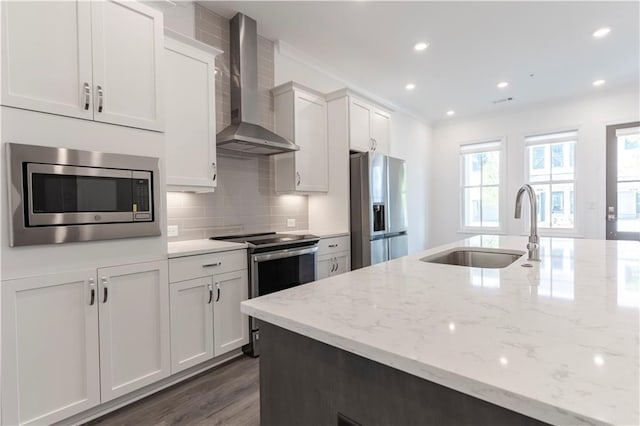 4948 Sudbrook Way, Peachtree Corners, GA 30092 - kitchen with wall chimney exhaust hood, white cabinets, tasteful backsplash, a sink, and appliances with stainless steel finishes