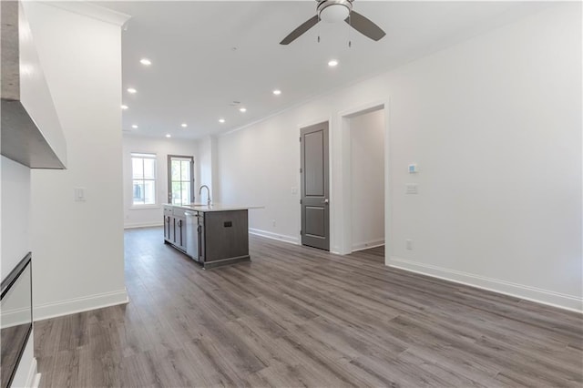 4948 Sudbrook Way, Peachtree Corners, GA 30092 - unfurnished living room with ceiling fan, recessed lighting, baseboards, wood finished floors, and ornamental molding