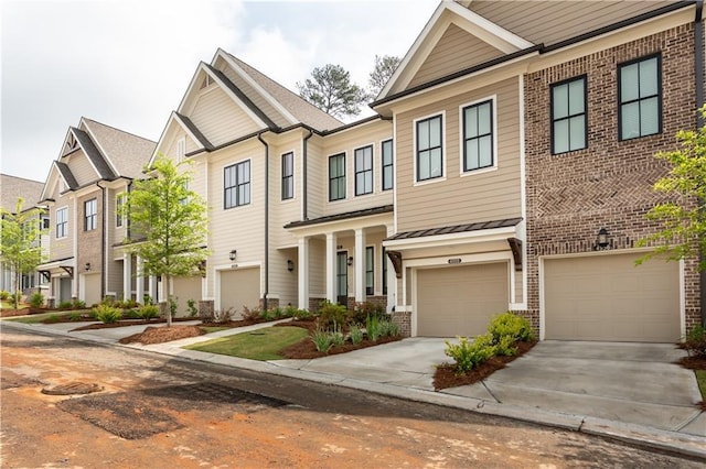 4948 Sudbrook Way, Peachtree Corners, GA 30092 - multi unit property with brick siding, a garage, driveway, and a standing seam roof