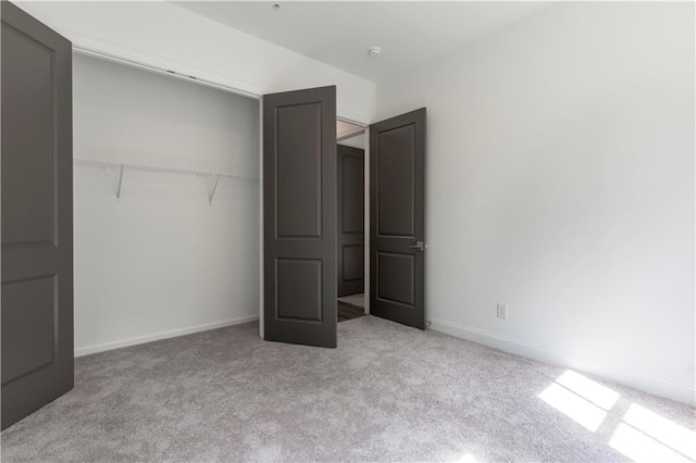 4948 Sudbrook Way, Peachtree Corners, GA 30092 - unfurnished bedroom featuring a closet, carpet flooring, and baseboards