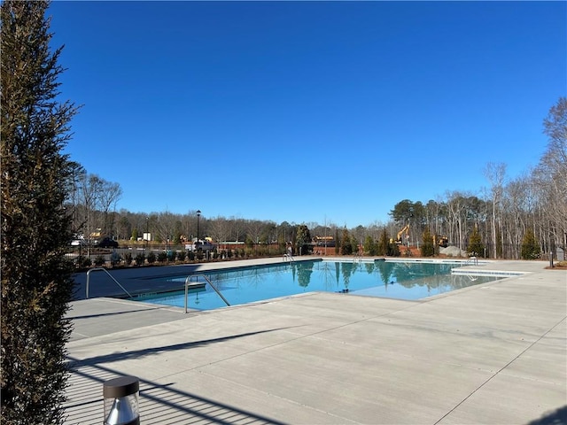 community pool featuring a patio