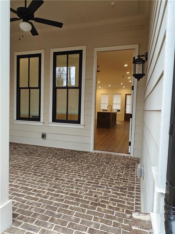 view of patio / terrace with ceiling fan