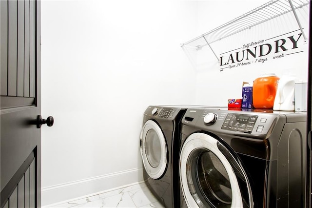 laundry room with independent washer and dryer