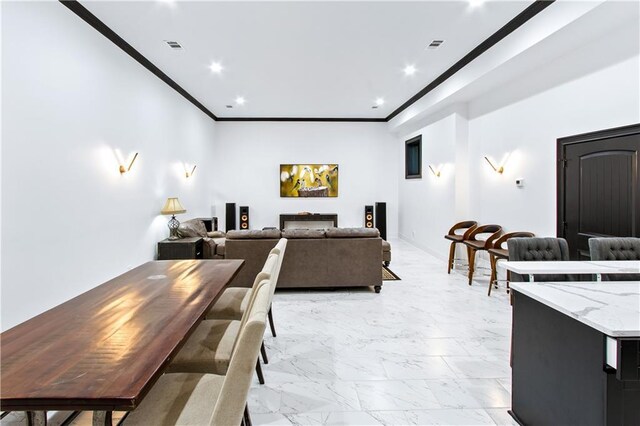 living room with ornamental molding