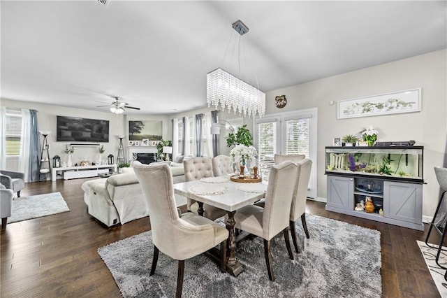 450 Noblewood Dr, Mcdonough, GA 30252 - dining room with a ceiling fan, dark wood-style flooring, and a chandelier