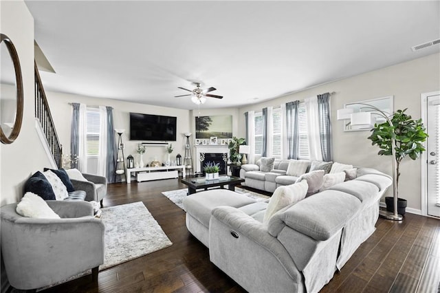 450 Noblewood Dr, Mcdonough, GA 30252 - living room featuring healthy amount of natural light, a ceiling fan, stairway, and a fireplace