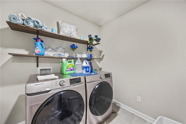 450 Noblewood Dr, Mcdonough, GA 30252 - laundry room with separate washer and dryer and baseboards