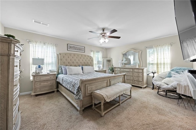 450 Noblewood Dr, Mcdonough, GA 30252 - bedroom with multiple windows, light colored carpet, and a ceiling fan