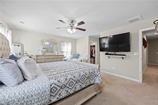 450 Noblewood Dr, Mcdonough, GA 30252 - bedroom with a spacious closet, carpet flooring, a closet, and a ceiling fan