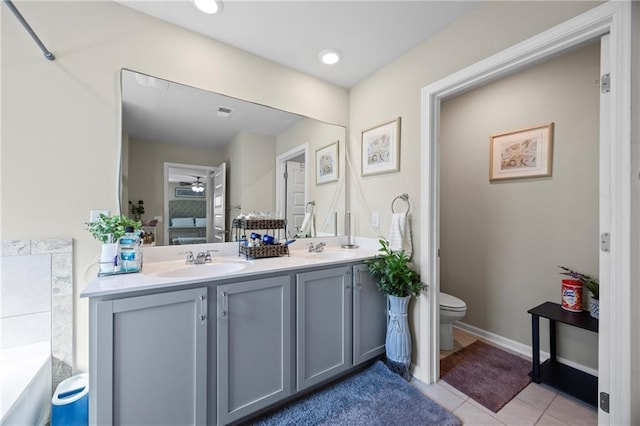 450 Noblewood Dr, Mcdonough, GA 30252 - bathroom with double vanity, tile patterned flooring, and ceiling fan