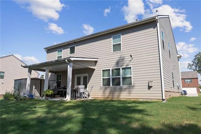 450 Noblewood Dr, Mcdonough, GA 30252 - rear view of house with a yard, a storage unit, and a patio