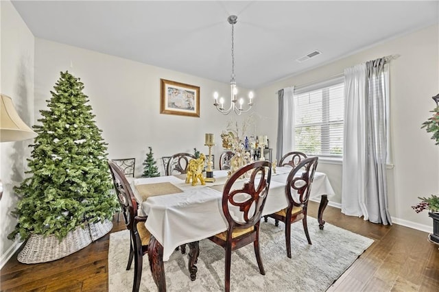 450 Noblewood Dr, Mcdonough, GA 30252 - dining space with a chandelier and hardwood / wood-style floors