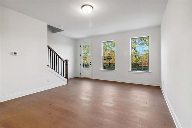 interior space with dark wood-type flooring