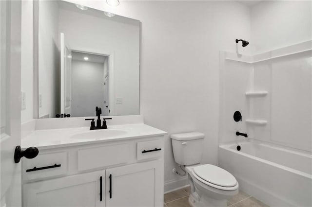 full bathroom featuring tile patterned flooring, vanity, washtub / shower combination, and toilet