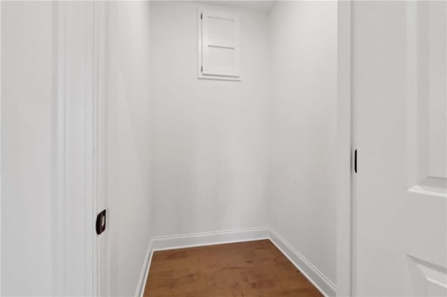 walk in closet featuring dark hardwood / wood-style flooring