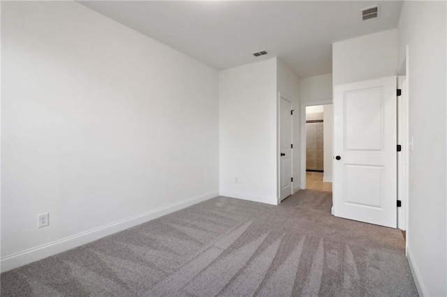 unfurnished bedroom with light carpet