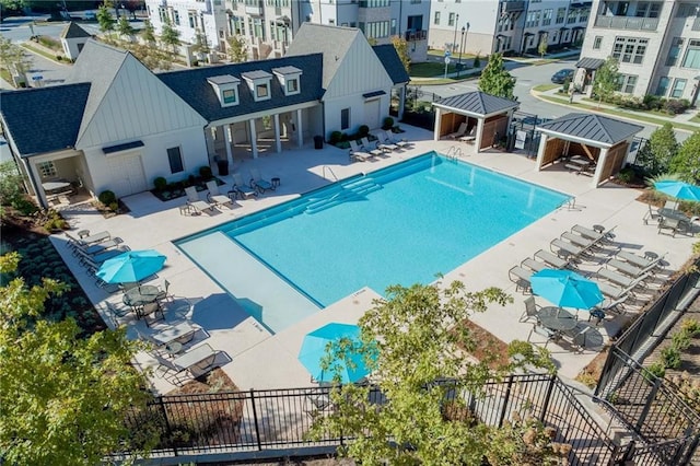 view of swimming pool featuring a gazebo and a patio area