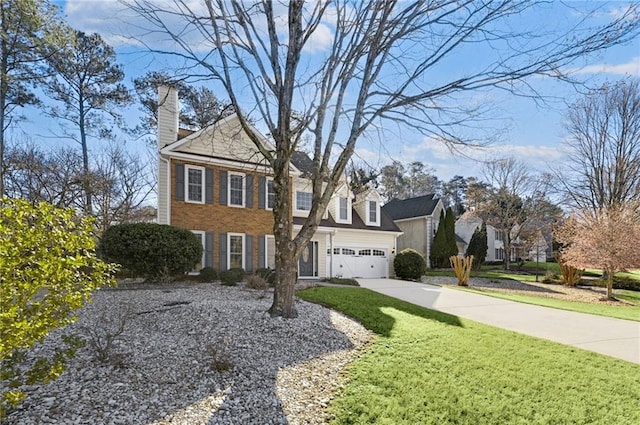 view of front of house featuring a front yard, concrete driveway, a residential view, and a chimney