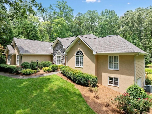 2140 Old Orchard Ln, Canton, GA 30114 - view of front of home featuring stucco siding, a front lawn, and an attached garage