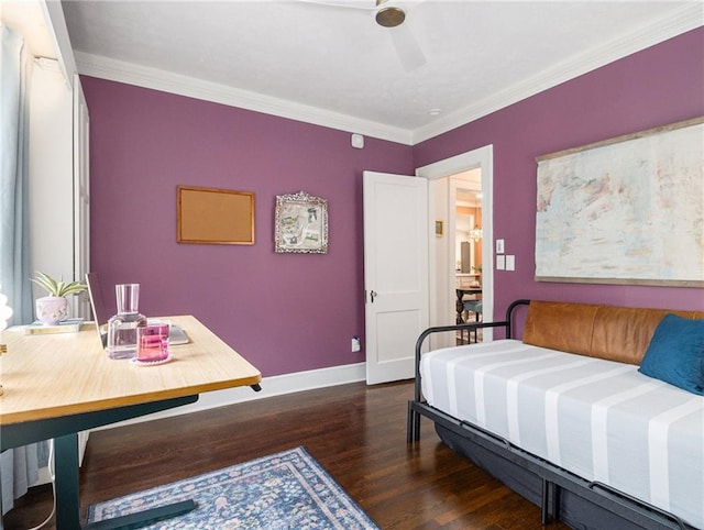 bedroom with dark wood-type flooring, crown molding, baseboards, and a ceiling fan