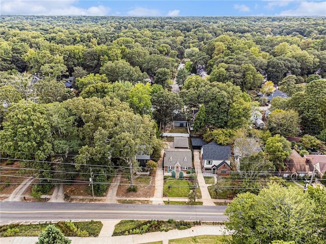 bird's eye view featuring a view of trees