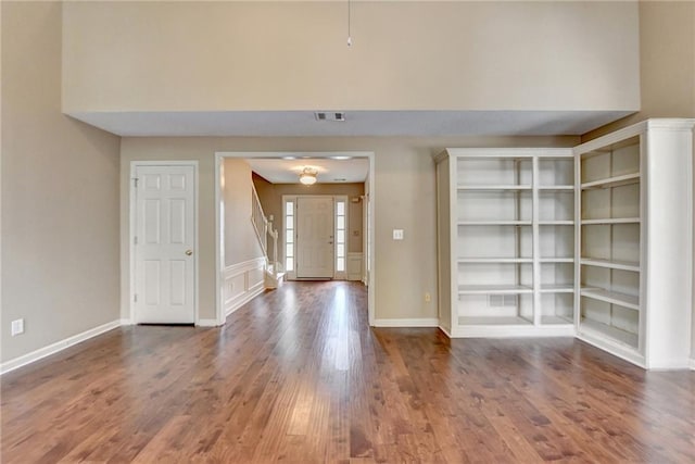 12060 Carriage Park Ln, Duluth, GA 30097 - foyer entrance with wood finished floors and baseboards