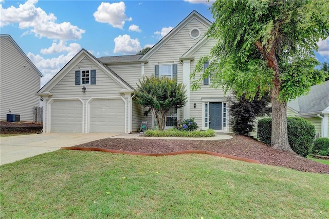 12060 Carriage Park Ln, Duluth, GA 30097 - traditional home with concrete driveway, a front yard, central AC unit, and an attached garage