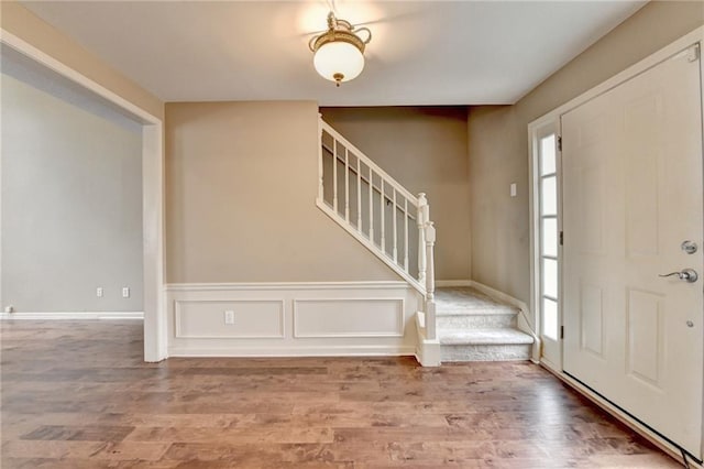 12060 Carriage Park Ln, Duluth, GA 30097 - entrance foyer featuring stairway, wood finished floors, and baseboards