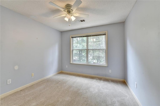 12060 Carriage Park Ln, Duluth, GA 30097 - carpeted empty room with a ceiling fan, a textured ceiling, and baseboards