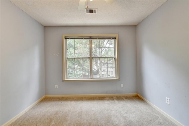 12060 Carriage Park Ln, Duluth, GA 30097 - carpeted empty room featuring a textured ceiling and baseboards