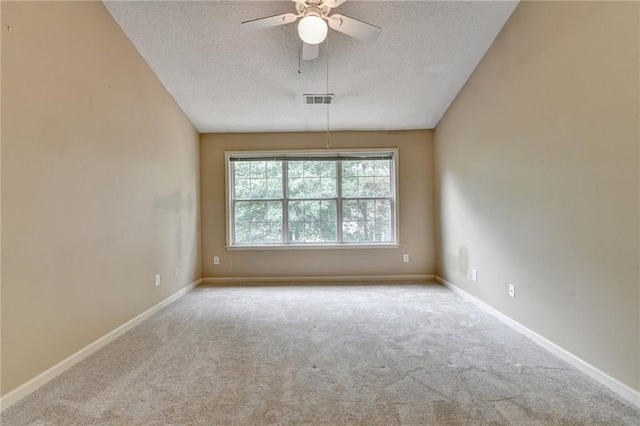12060 Carriage Park Ln, Duluth, GA 30097 - carpeted spare room with a textured ceiling, ceiling fan, and baseboards