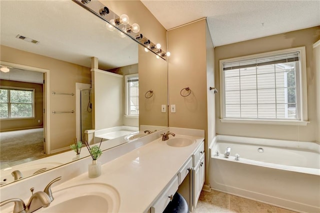 12060 Carriage Park Ln, Duluth, GA 30097 - bathroom with a bath, double vanity, and a shower stall