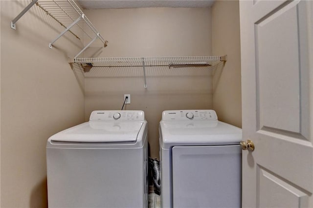 12060 Carriage Park Ln, Duluth, GA 30097 - laundry room featuring washing machine and dryer