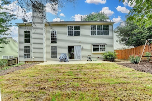 12060 Carriage Park Ln, Duluth, GA 30097 - back of house featuring a patio area and a chimney