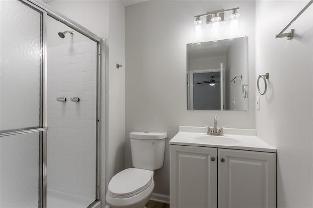 740 Stoneside Ct, Stone Mountain, GA 30083 - bathroom featuring toilet, a shower stall, vanity, and ceiling fan