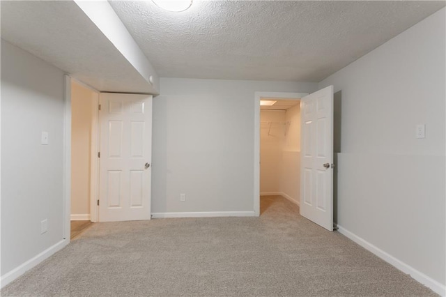740 Stoneside Ct, Stone Mountain, GA 30083 - carpeted spare room featuring baseboards and a textured ceiling