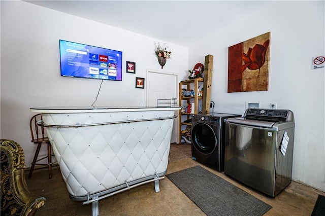 laundry room featuring independent washer and dryer