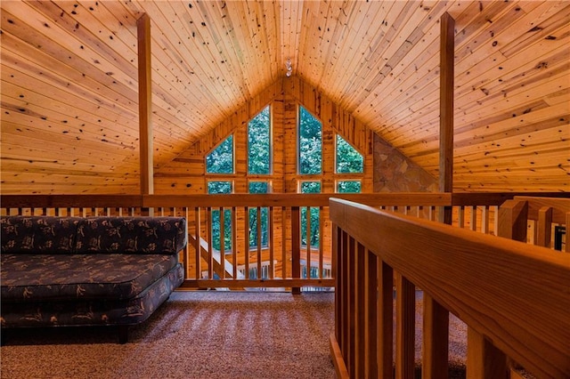 unfurnished bedroom featuring lofted ceiling with beams, carpet, and wooden ceiling