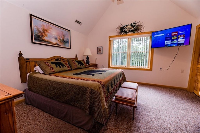 carpeted bedroom featuring lofted ceiling