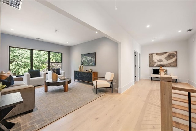 3292 Lenox Pl NE, Atlanta, GA 30324 - living area featuring light wood finished floors and recessed lighting
