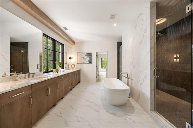 3292 Lenox Pl NE, Atlanta, GA 30324 - full bath featuring double vanity, marble finish flooring, a freestanding tub, and a shower stall