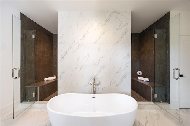 3292 Lenox Pl NE, Atlanta, GA 30324 - full bath featuring tile walls, marble tiled floors, a freestanding tub, and a shower stall