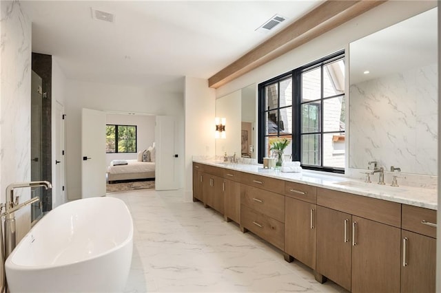 3292 Lenox Pl NE, Atlanta, GA 30324 - bathroom with double vanity, marble finish flooring, a soaking tub, and ensuite bath