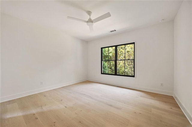3292 Lenox Pl NE, Atlanta, GA 30324 - unfurnished room featuring light wood-style floors and a ceiling fan