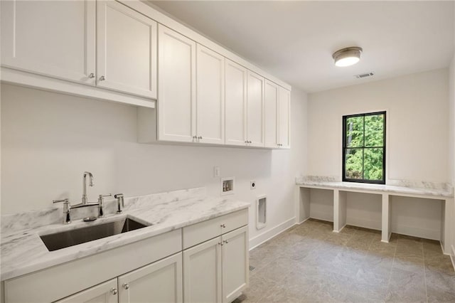 3292 Lenox Pl NE, Atlanta, GA 30324 - laundry area with hookup for an electric dryer, cabinet space, and washer hookup