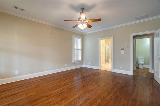 unfurnished bedroom featuring ensuite bathroom, crown molding, and visible vents