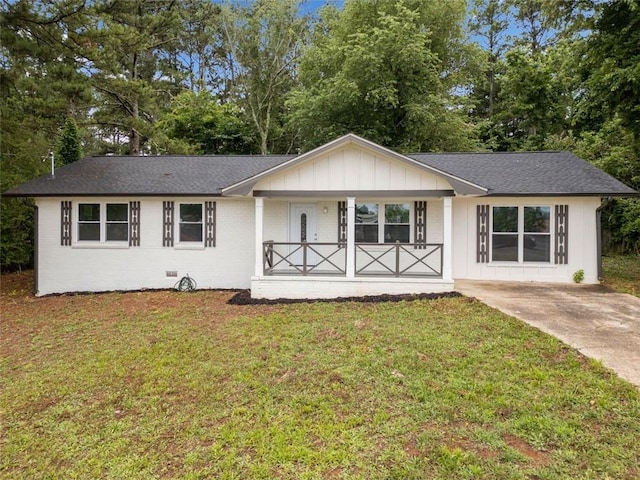 8535 Hiram Acworth Hwy, Dallas, GA 30157 - ranch-style home with covered porch, a front yard, board and batten siding, and a shingled roof