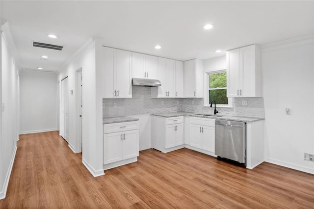 8535 Hiram Acworth Hwy, Dallas, GA 30157 - kitchen featuring dishwasher, under cabinet range hood, decorative backsplash, light wood-style flooring, and ornamental molding